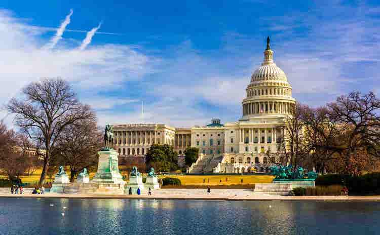Historic White House in Washington D.C. showcasing America's presidential residence surrounded by manicured gardens and iconic national landmarks.