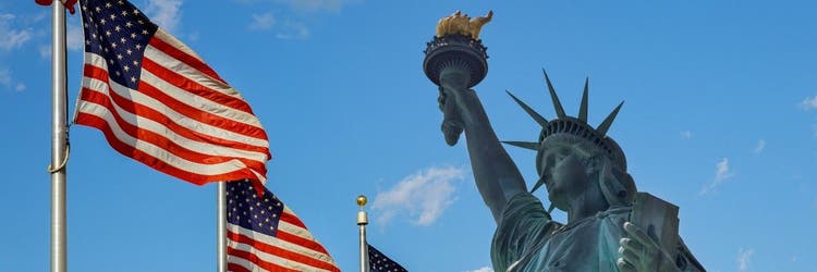 Iconic Statue of Liberty standing proudly on Liberty Island, symbolizing freedom, democracy, and welcoming visitors to New York Harbor worldwide.